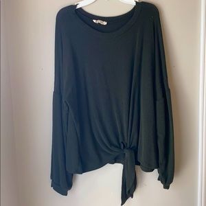 Long bubble sleeve with tie knot detail.